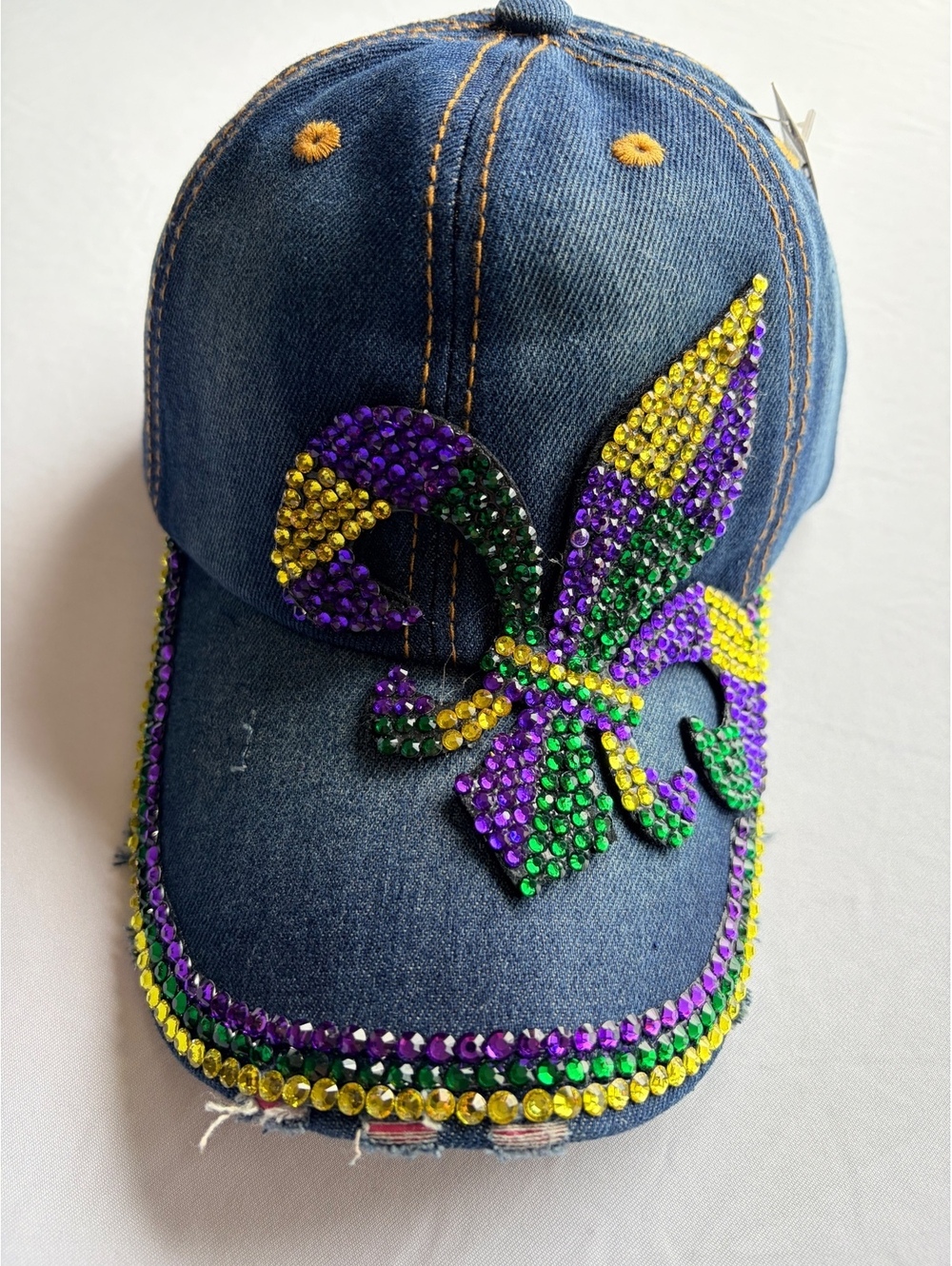 Marti Grass Denim Hat with Purple, Green, and Yellow Rhinestone Fleur-de-Lis Emb